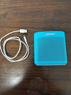 Bose Turquoise Portable Bluetooth Speaker with White USB Cable
